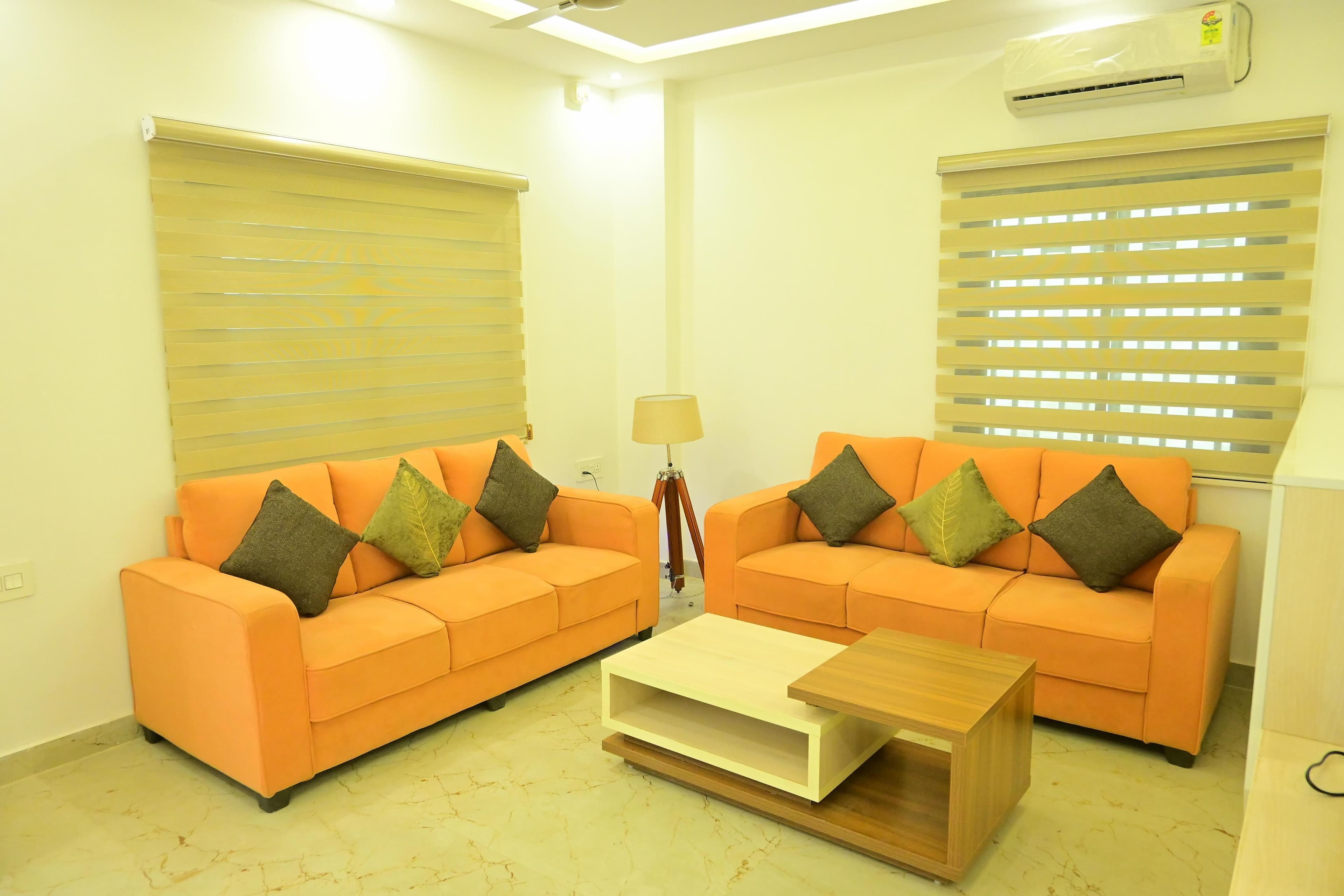 The welcoming guest lounge at The Tribhuvan Residency, Ayodhya